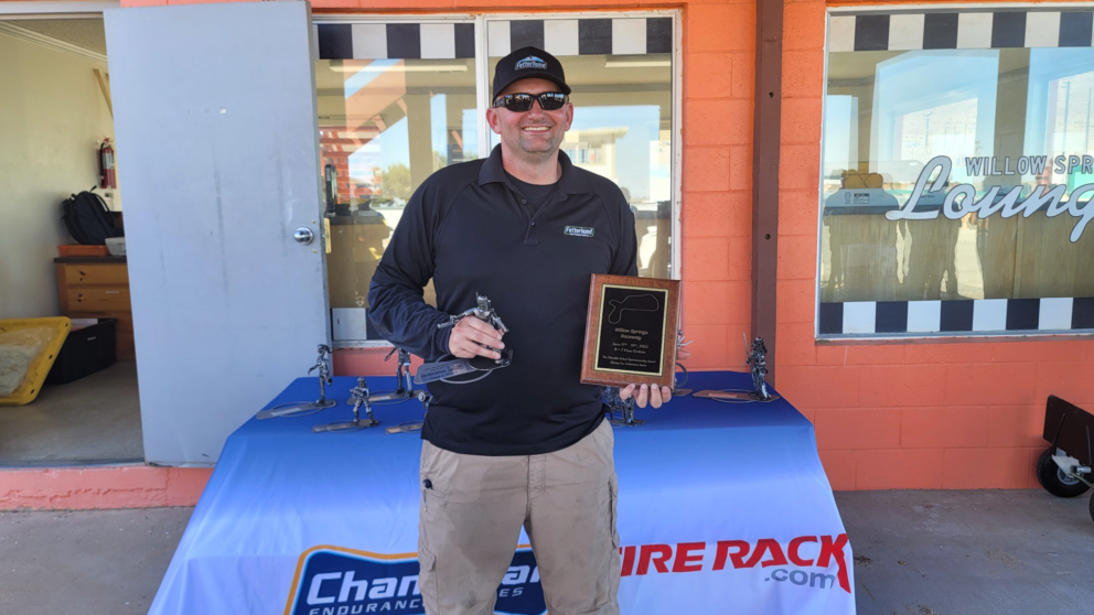 Posing with Fetterhund Motorsports' award